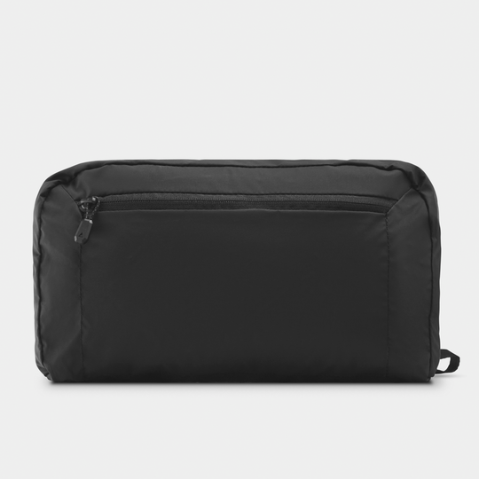 Collapsed Nomatic Navigator Collapsible Duffle 42L Black Bottom View