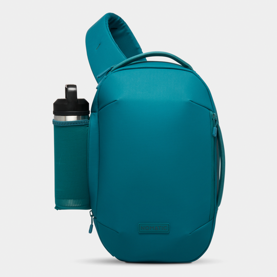 Nomatic Juniper Navigator RS Sling 10L With Water Bottle Front View#color_juniper