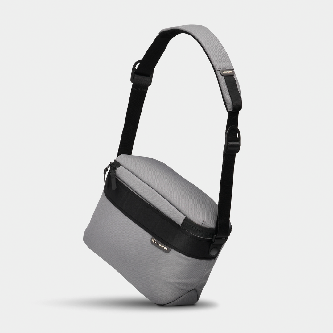 Luma Camera Sling 12L Stone Side Angle View With Strap #color_stone