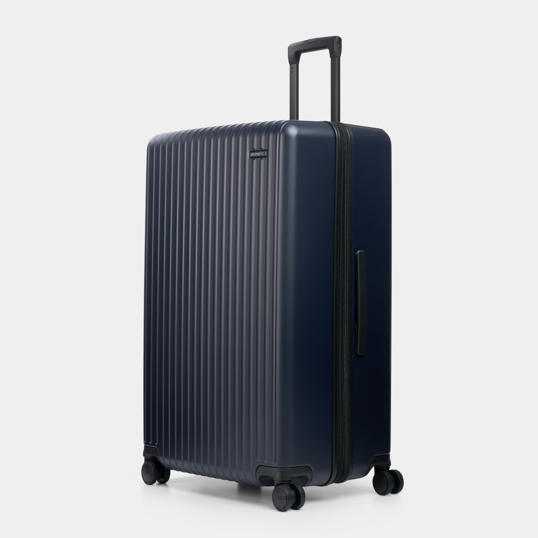 Side angle view of the Method Luggage Check-In color navy
#color_navy