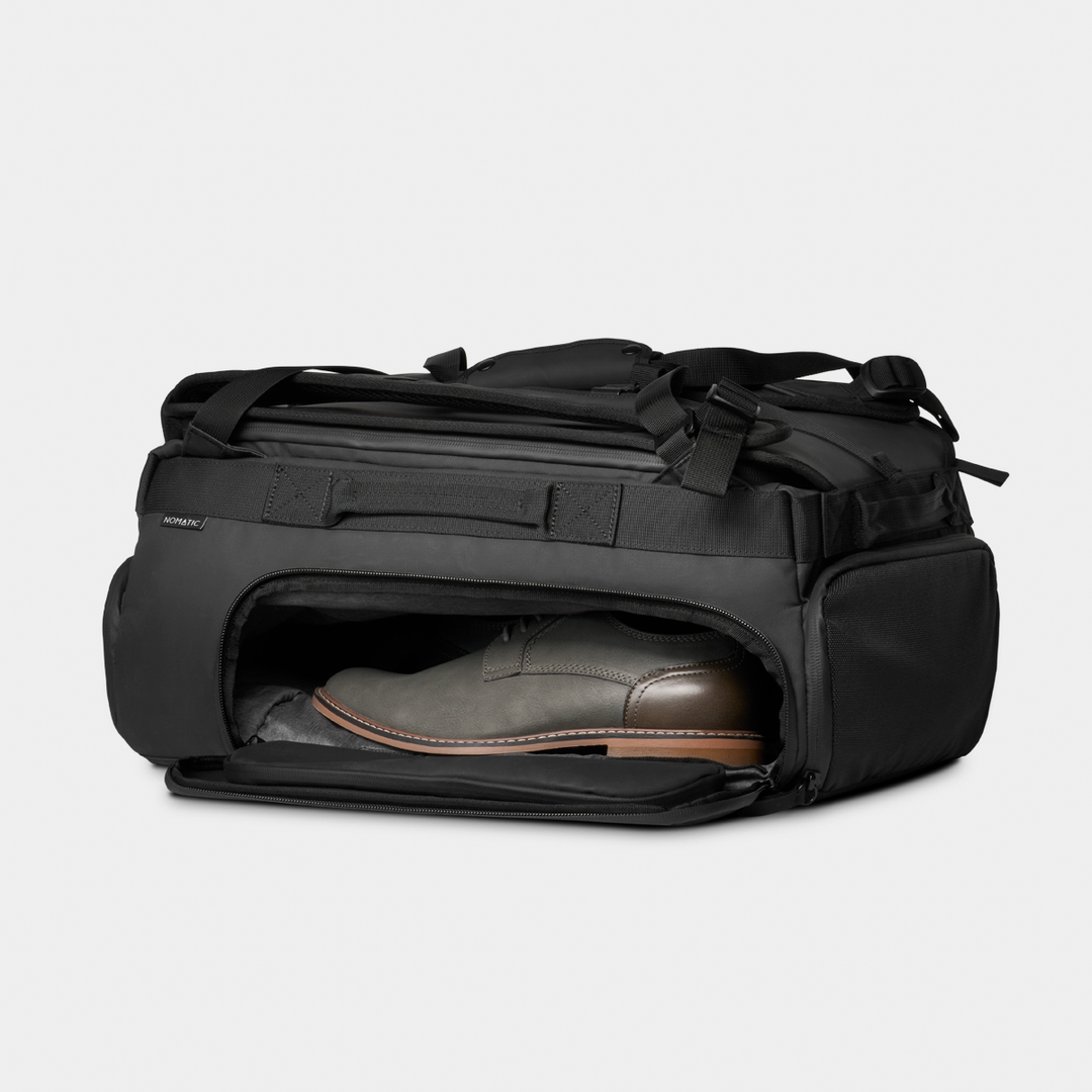 Nomatic Black Travel Bag 30L Side Open Pocket Shoe Storage View