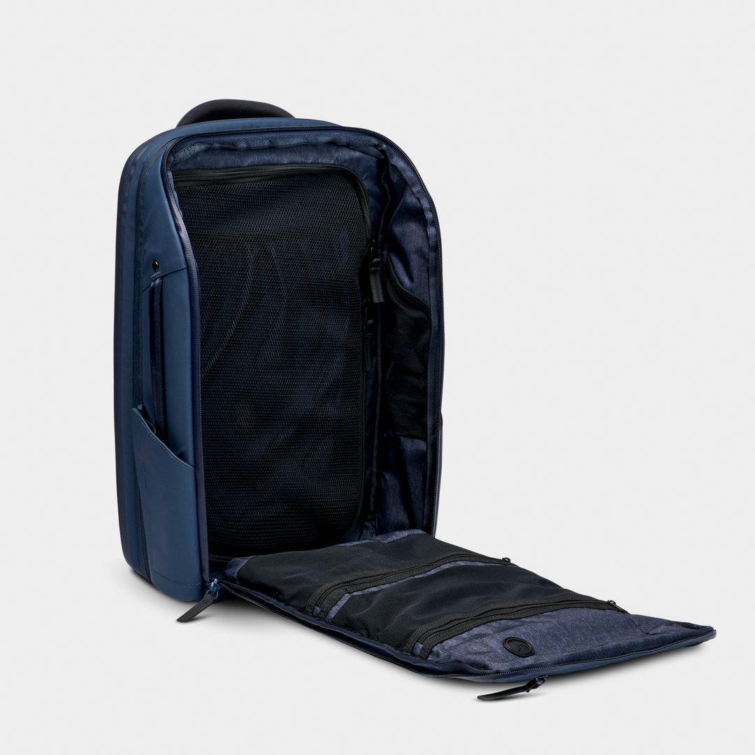 Nomatic Navy Travel Pack Open Pocket Front Angle View#color_navy